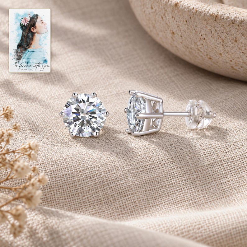Moissanite Stud Earrings, laid on fabric. A sample personalized digital greeting card is shown alongside.