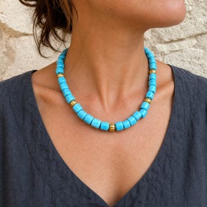 Three-piece handmade necklace set featuring gray and silver beaded necklace, rose gold and silver beaded necklace and gray and white beaded necklace, displayed together to show the coordinated colors and beadwork