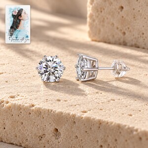 Moissanite Stud Earrings, shown in natural light. A sample personalized digital greeting card is shown alongside.