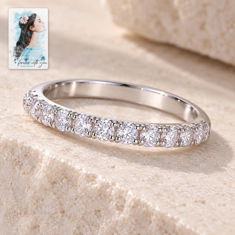 Moissanite Half Eternity Ring, shown on a display surface. A sample personalized digital greeting card is shown alongside.