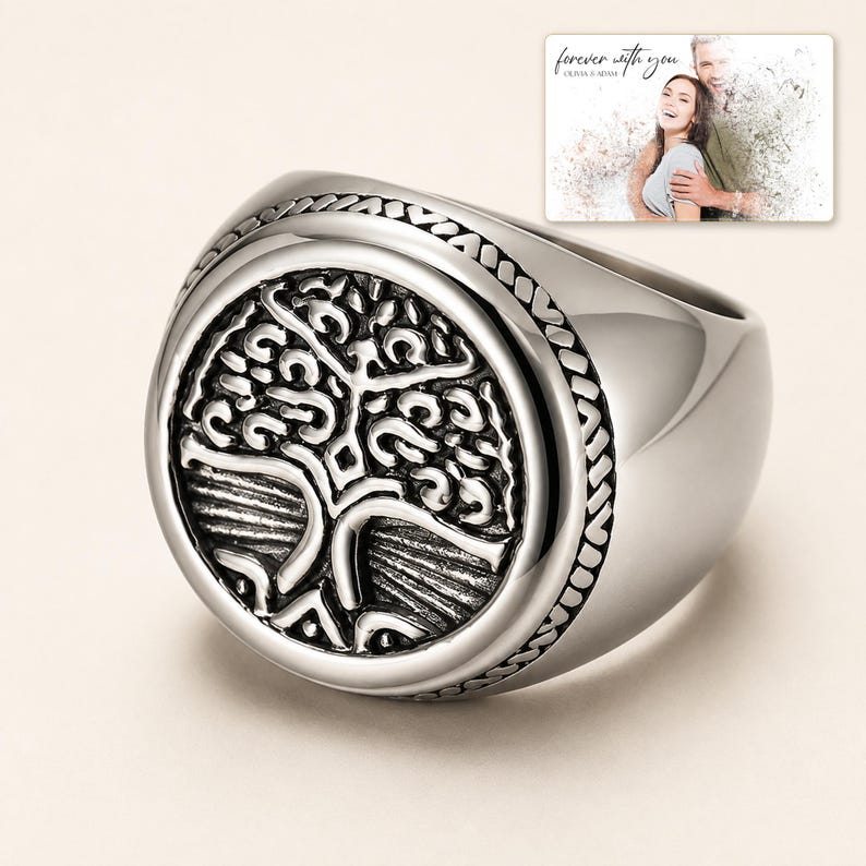 Silver-tone ring with a round tree motif, display view. A personalized greeting-card example appears in the corner.