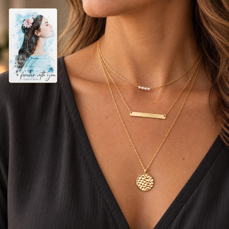 Adult woman wearing all three necklaces with a charcoal blouse in soft evening light. A personalized digital greeting card is shown alongside.