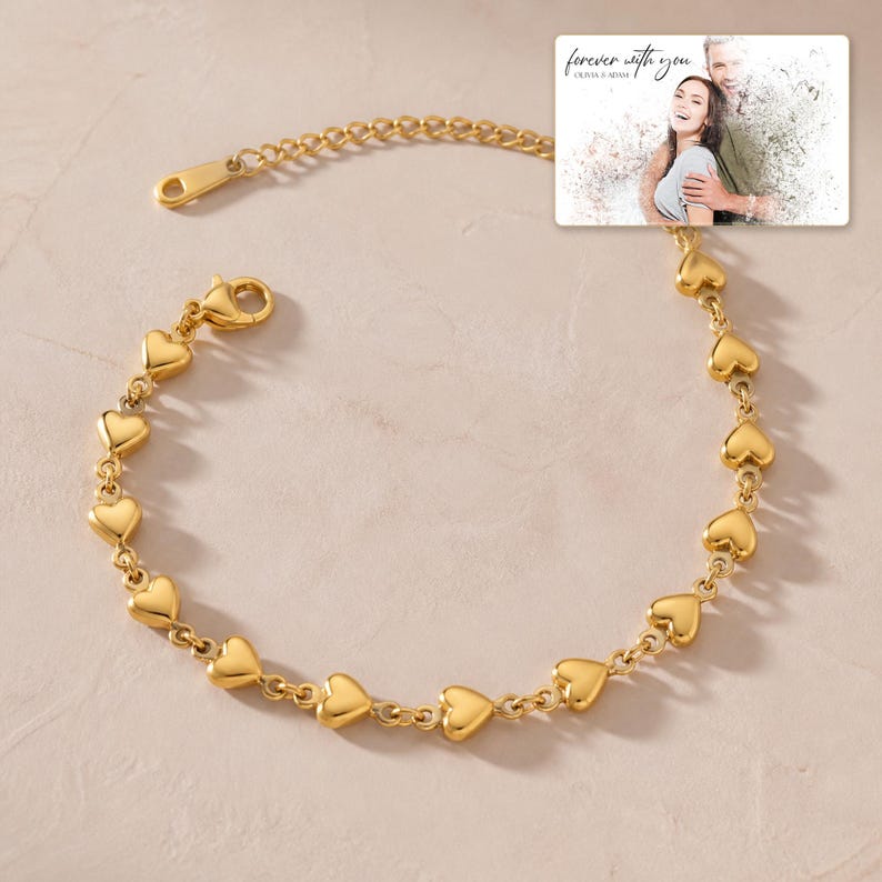 Linked Hearts Steel Bracelet photographed in warm natural window light in an elegant home setting.