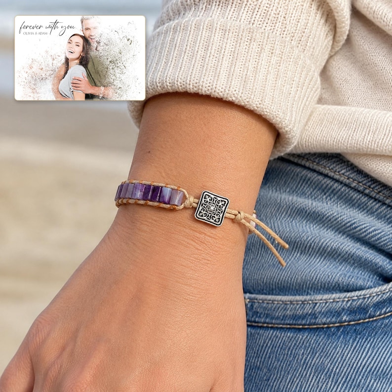 Purple rectangular-bead cord bracelet with a square decorative detail, worn view. A personalized greeting-card example appears in the corner.