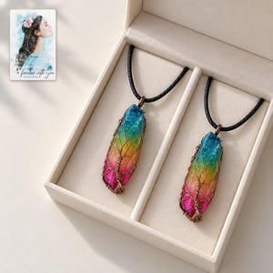 Rainbow Tree Stone Necklace, displayed in a presentation box. A sample personalized digital greeting card is shown alongside.