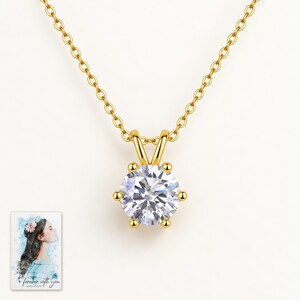 Moissanite Solitaire Necklace, shown against a light background. A sample personalized digital greeting card is shown alongside.