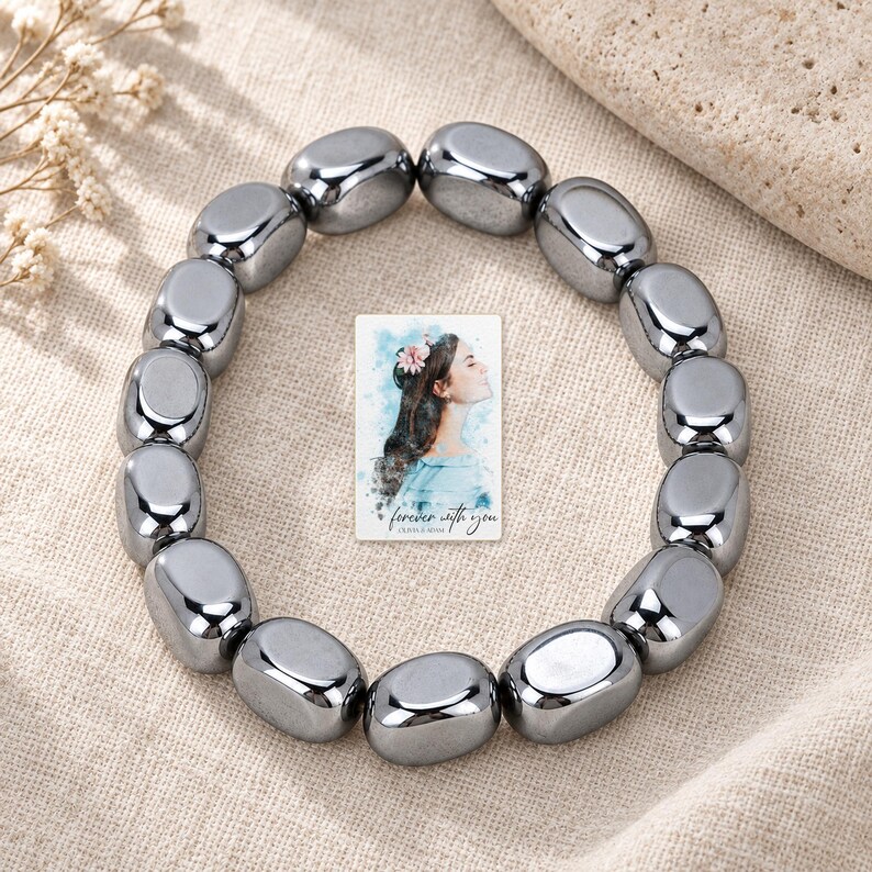 Metallic Grey Bead Bracelet, linen flatlay view. A personalized digital greeting card is shown alongside.