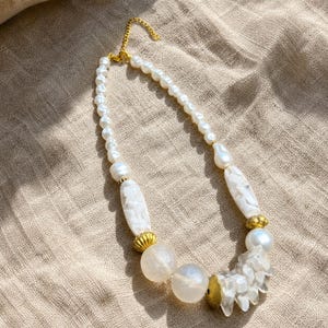 Gift ready presentation of Beige and Silver Statement Beaded Necklace, Boho Handmade Jewelry, Artisan Gift for Her in an open jewelry box lined with natural ivory linen