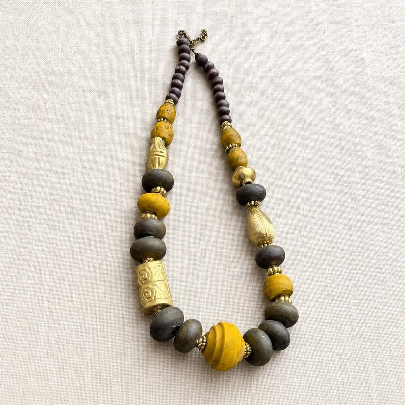 Red beaded necklace with colorful teardrop focal beads from the four piece boho jewelry set