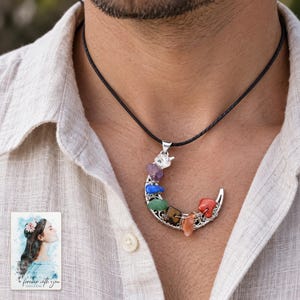 Rainbow Chip Moon Necklace, worn with daytime clothing. A sample personalized digital greeting card is shown alongside.