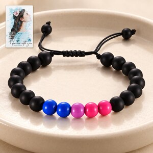 Black Bead Bracelet, macro detail view. A personalized digital greeting card is shown alongside.