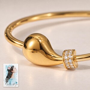 Gold Tone Cuff Bracelet, close-up of the details. A sample personalized digital greeting card is shown alongside.