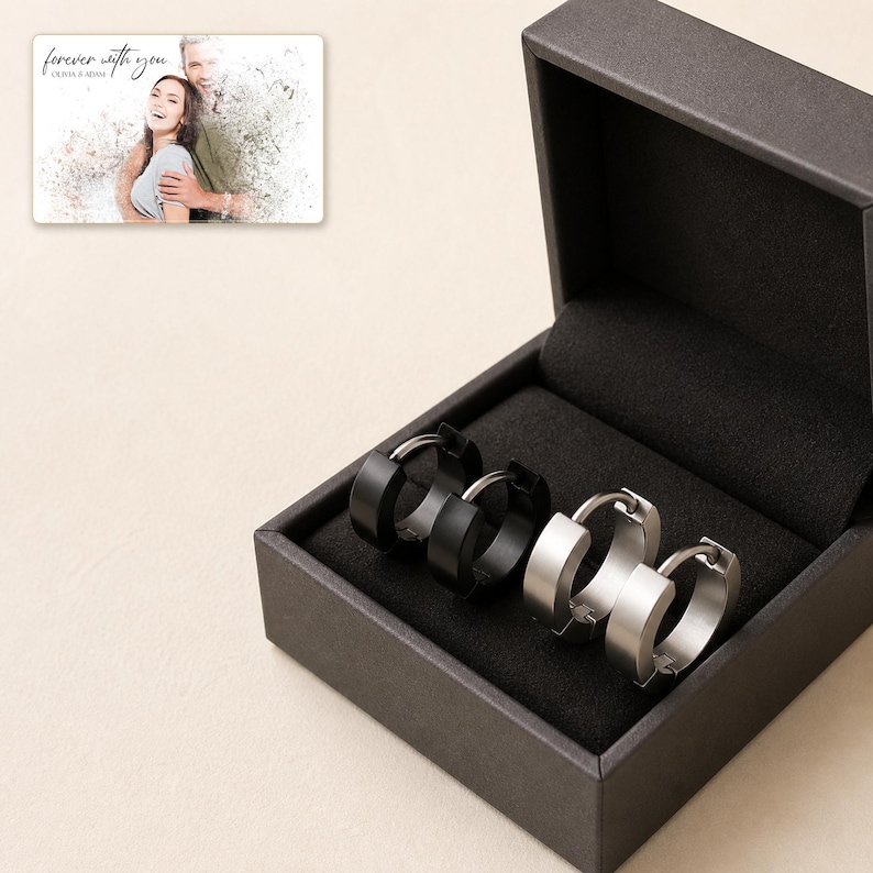 EdgeLine Stainless Huggie Hoops styled for an elegant evening look with the product remaining the clear focal point.
