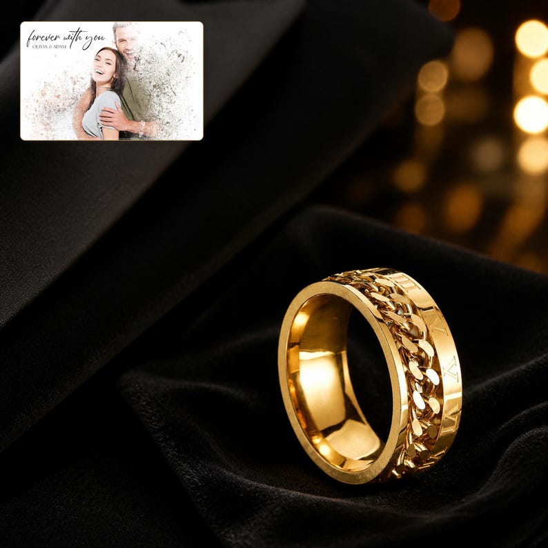 CipherSpin Roman Chain Ring arranged on soft ivory linen in a refined neutral flat lay.