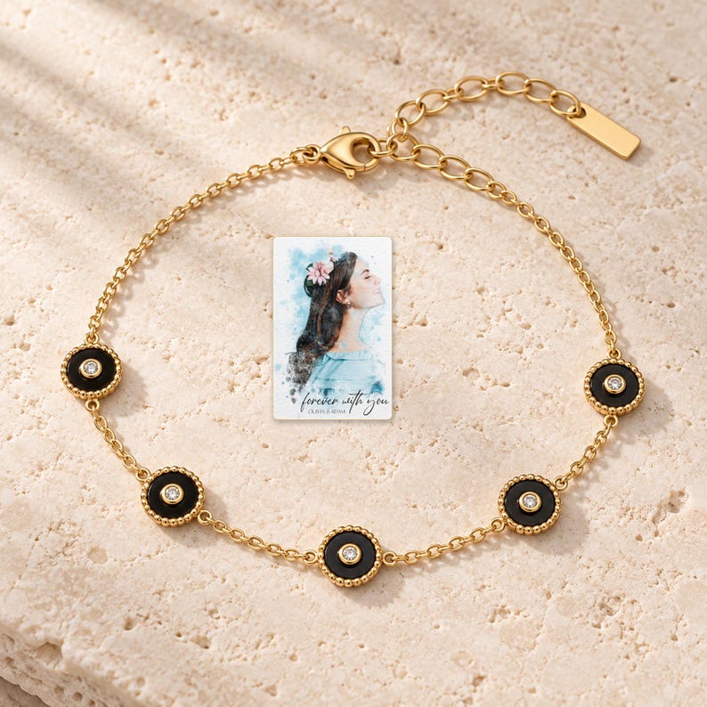 Black Disc Bracelet, shown on a display surface. A sample personalized digital greeting card is shown alongside.