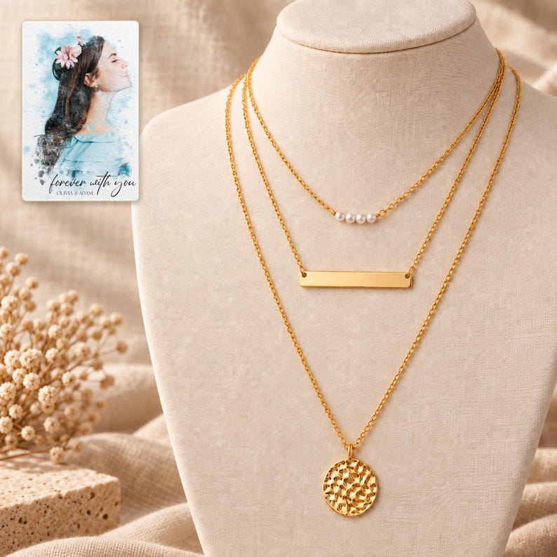 pearl-style beads, bar and hammered coin necklace trio on an ivory display with oatmeal linen styling. A personalized digital greeting card is shown alongside.