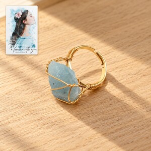 Blue Wire Wrapped Ring, sunlit home view. A personalized digital greeting card is shown alongside.