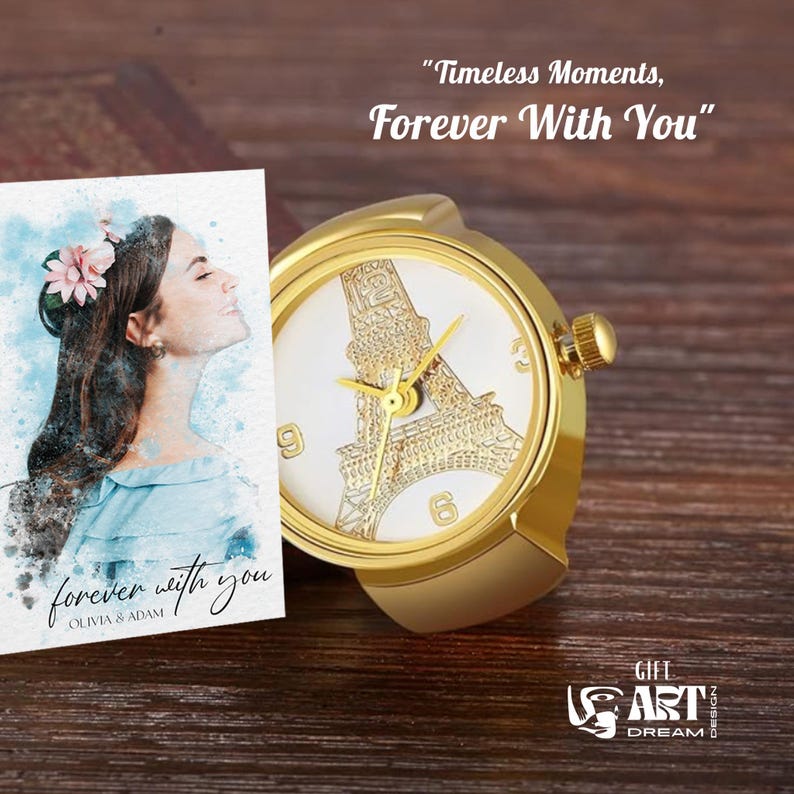 May include: A gold ring watch with a white face featuring a gold Eiffel Tower design. The watch has gold hands and a small crown. A watercolor portrait and the text "forever with you" are also visible.
