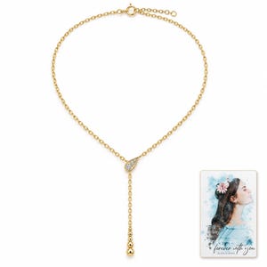Moissanite Y Necklace, catalog view. A personalized digital greeting card is shown alongside.