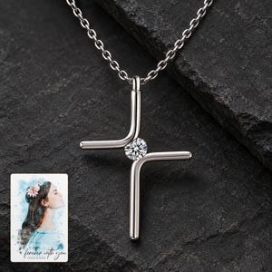 Cross Pendant Necklace, shown against a dark background. A sample personalized digital greeting card is shown alongside.