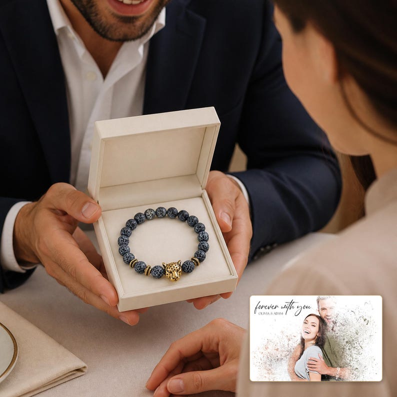 Storm Marbled Leopard Bracelet shown during a believable gift-giving moment between adults with the exact jewelry visible.