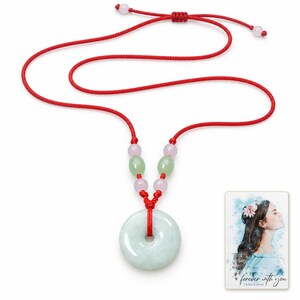 Peace Circle Green Cord Necklace shown on a clean white catalog background for an unobstructed product view. A personalized digital greeting card is shown alongside.