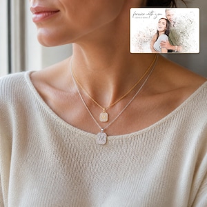 Mosaic Initial M Necklace Duo worn by an adult in a polished evening lifestyle scene.