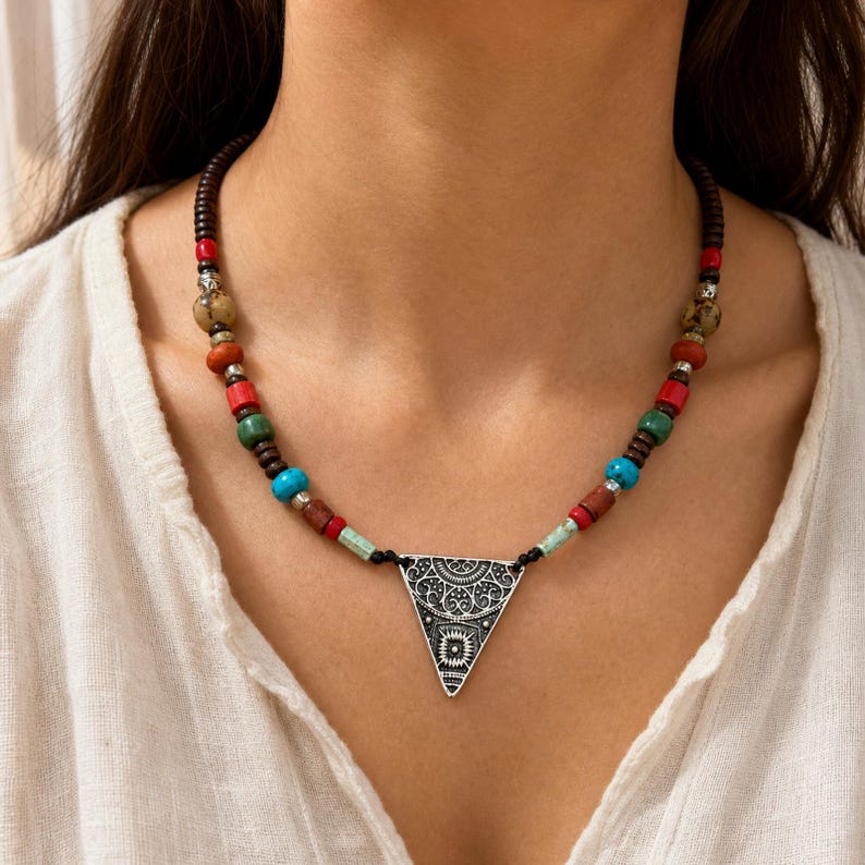 Multicolor Triangle Pendant Necklace displayed on a jewelry bust, showing the necklace shape and artisan bead details