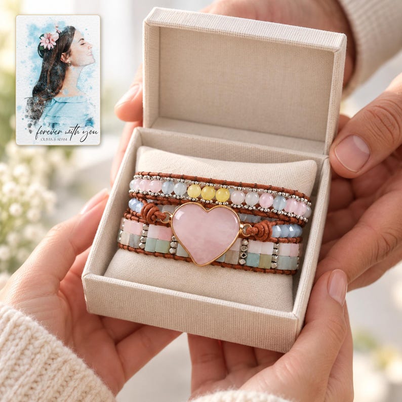 Pastel Heart Wrap Bracelet shown during a believable gift-giving moment between adults with the jewelry visible. A personalized digital greeting card is shown alongside.