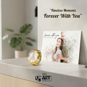 May include: A gold ring watch with a white face featuring the Eiffel Tower. A photograph with the text "forever with you" and a couple is displayed. The image also includes the text "Timeless Moments, Forever With You."