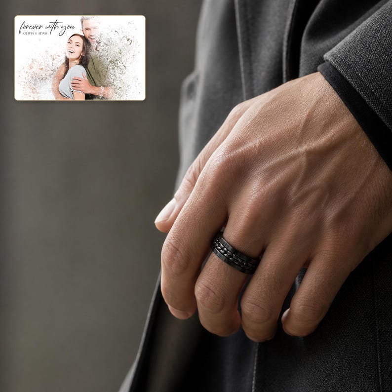 CipherSpin Roman Chain Ring worn by an adult in a polished evening lifestyle scene.