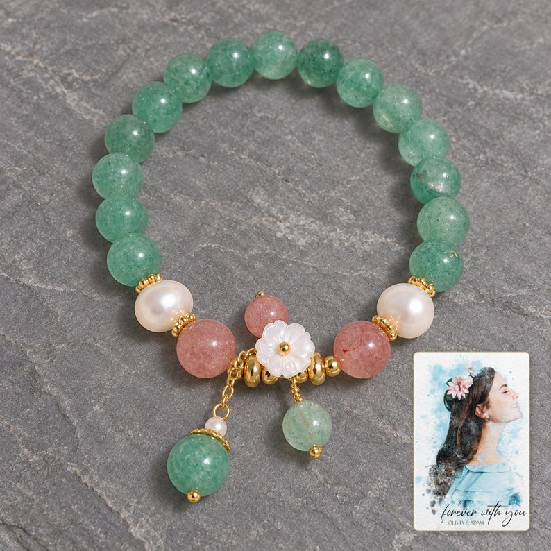 Forest Strawberry clear accents Bracelet styled against a dark luxury surface with the exact product finish clearly visible. A personalized digital greeting card is shown alongside.