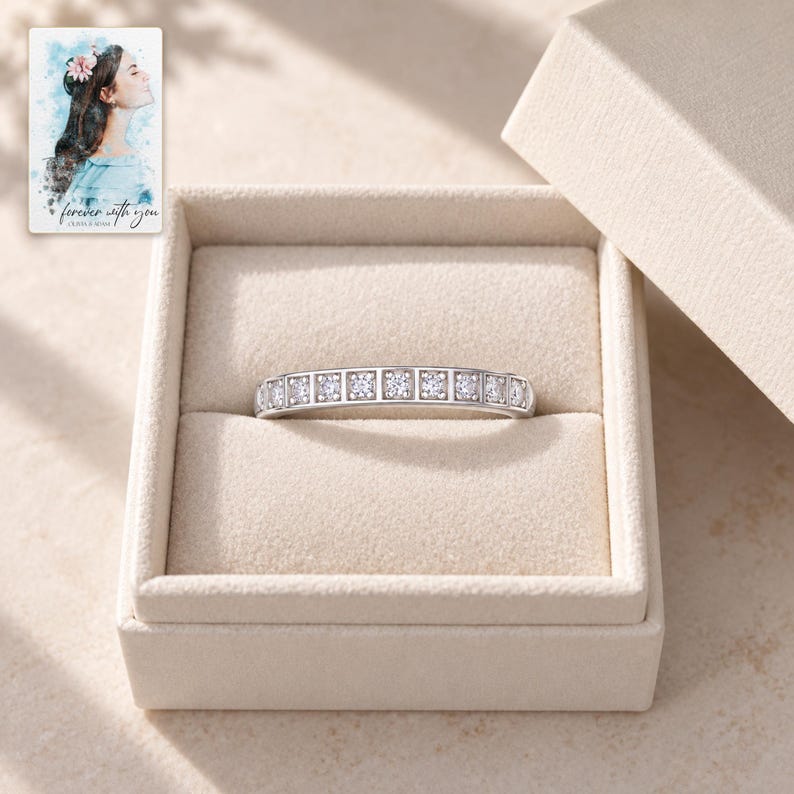 Moissanite Band Ring, displayed in a presentation box. A sample personalized digital greeting card is shown alongside.
