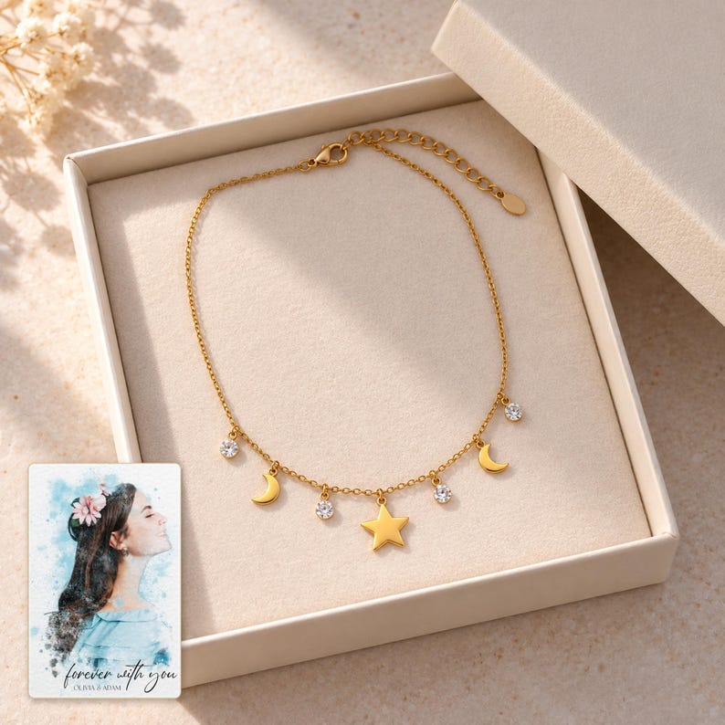 Moon and Star Necklace, displayed in a presentation box. A sample personalized digital greeting card is shown alongside.