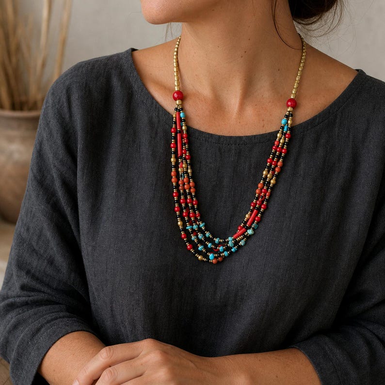 Red and Brown Statement Beaded Necklace, Boho Handmade Jewelry, Artisan Gift for Her worn with a charcoal linen top in a natural outdoor setting