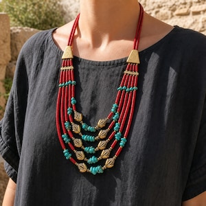 Three-piece handmade necklace set featuring brown and gray beaded necklace, gray and brown beaded necklace and gray and brown beaded necklace, displayed together to show the coordinated colors and beadwork