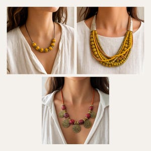 May include: A collection of three necklaces: one with yellow beads on a dark cord, one with multiple strands of yellow and brown beads featuring silver-toned end caps, and one with pink speckled beads and gold-toned textured circular pendants.