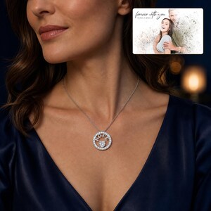 Adult woman wearing the White Gold HOPE heart necklace in an elegant evening lifestyle scene.
