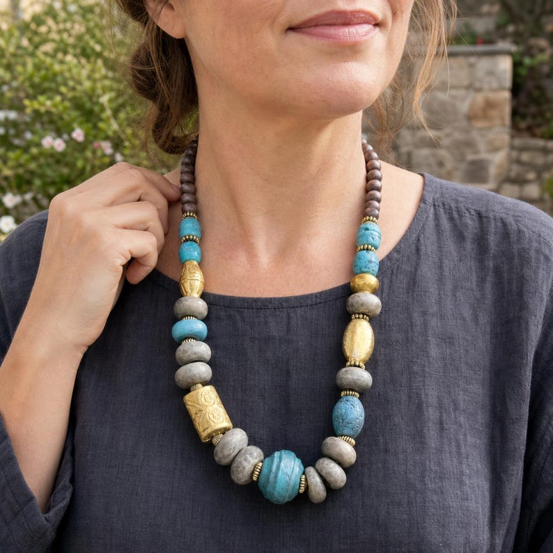 Three-piece handmade necklace set featuring silver and gray beaded necklace, gray and silver beaded necklace and rose gold and gray beaded necklace, displayed together to show the coordinated colors and beadwork