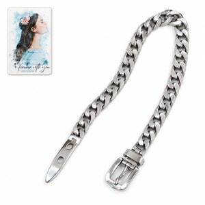 Open silver tone curb-chain bracelet on white, showing the pointed two-hole tab, buckle pin and keeper at separate ends. A personalized digital greeting card is shown alongside.