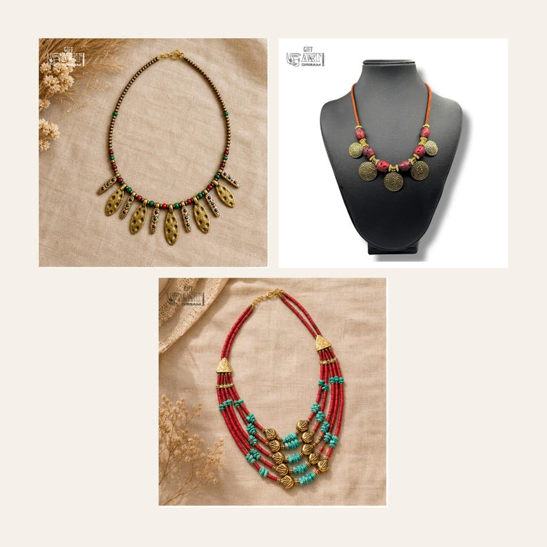 May include: Three necklaces are displayed. The first features red and green beads with gold-toned textured pendants. The second is a cord necklace with red beads and gold-toned discs. The third is a multi-strand necklace with red and turquoise beads.