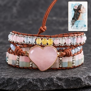 Pastel Heart Wrap Bracelet styled against a dark luxury surface with the exact product finish clearly visible. A personalized digital greeting card is shown alongside.
