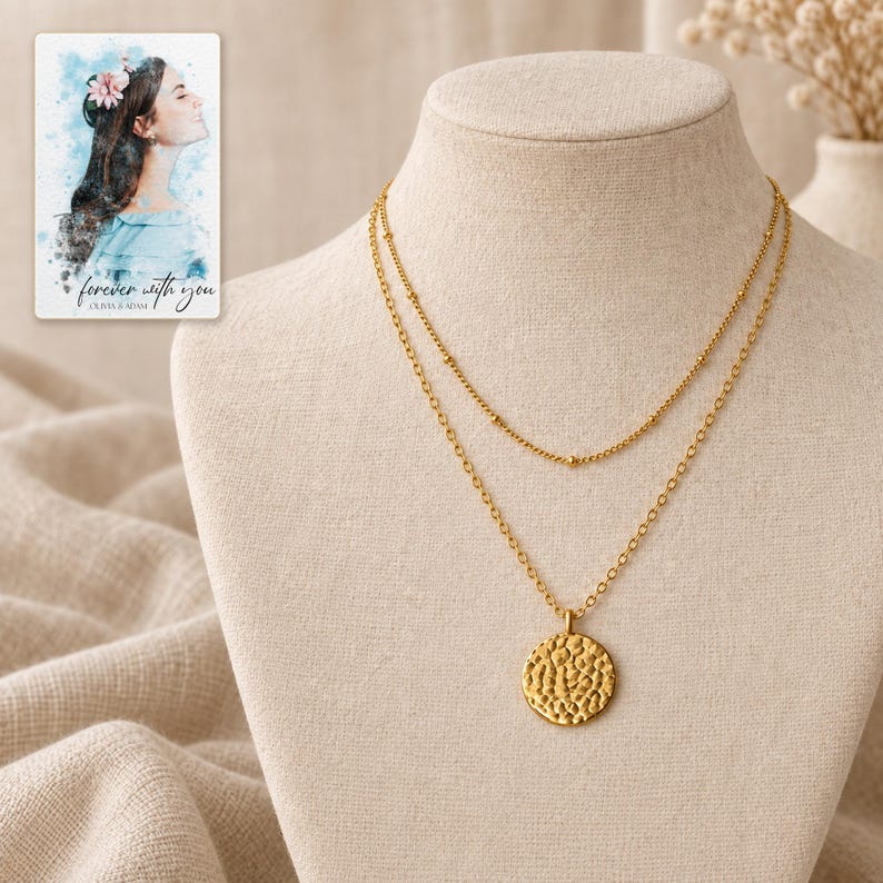 Gold Tone Coin Satellite Necklace arranged on soft ivory linen in a refined neutral flat lay. A personalized digital greeting card is shown alongside.