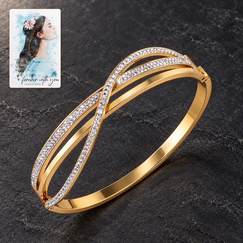 Crossover Bangle Bracelet, shown against a dark background. A sample personalized digital greeting card is shown alongside.