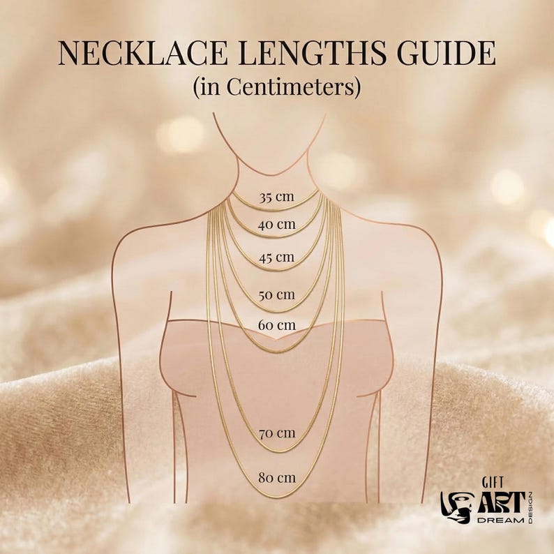 May include: A necklace length guide with a drawing of a person's neck and chest, showcasing various necklace lengths in centimeters. The guide includes measurements from 35 cm to 80 cm, with the text "NECKLACE LENGTHS GUIDE (in Centimeters)".