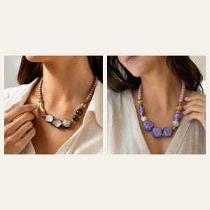 May include: Two necklaces featuring varied beads. The left necklace has mauve round beads, gold-toned spacers, and dark, iridescent, faceted stones. The right necklace features light purple round beads, gold-toned spacers, and violet faceted stones.