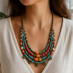Beige and Brown Statement Beaded Necklace presented in an open jewelry gift box on natural linen