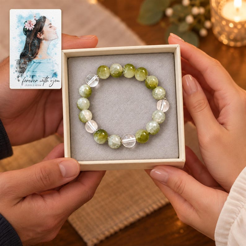 Forest Dew Bead Bracelet shown during a warm gift-receiving moment between adults with the jewelry visible. A personalized digital greeting card is shown alongside.