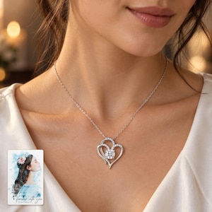 Double Heart Pendant Necklace, worn with evening clothing. A sample personalized digital greeting card is shown alongside.