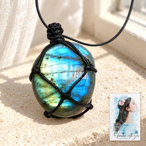 Labradorite Pendant Necklace, sunlit home view. A personalized digital greeting card is shown alongside.